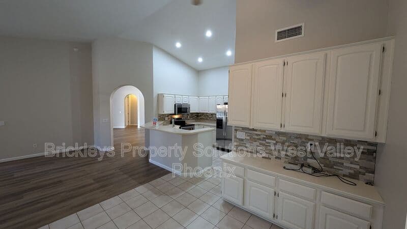 4-bedroom 3-bath home at 13354 W Palm Ln for $2,750/mo managed by Brickleys Property Solutions West Valley Phoenix — photo 18 of 31