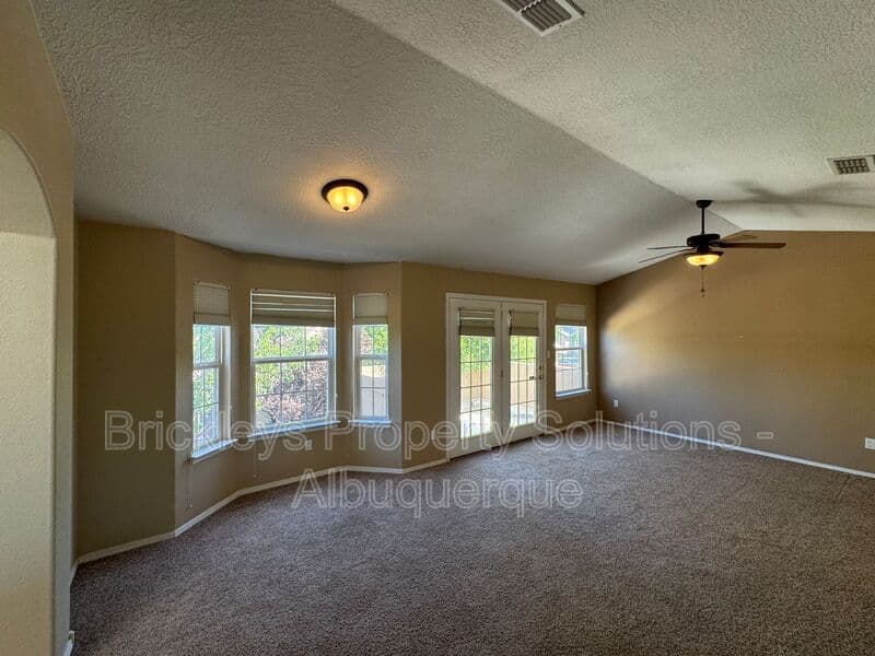 4-bedroom 3-bath home at 7131 Wild Olive Ave NE for $2,900/mo managed by Brickleys Property Solutions Albuquerque — photo 31 of 38