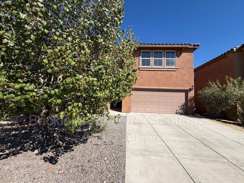 3-bedroom 2.5-bath home at 418 Paseo Roja Pl NE for $2,375/mo managed by Brickleys Property Solutions Albuquerque — photo 1 of 42