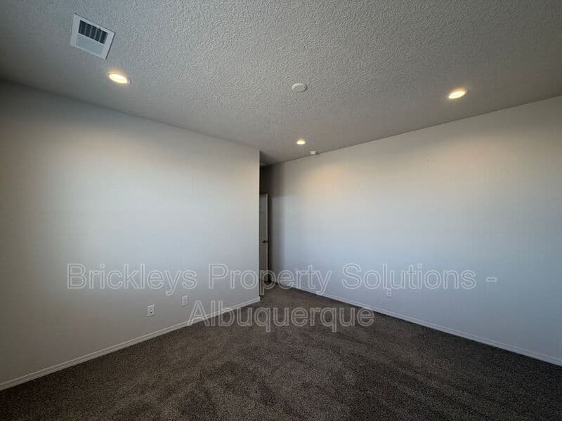 3-bedroom 2-bath home at 1504 Alto Colores for $2,100/mo managed by Brickleys Property Solutions Albuquerque — photo 12 of 30