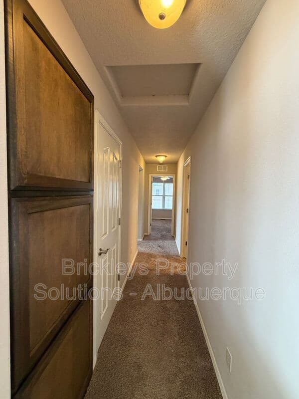 4-bedroom 2.5-bath home at 7420 Tangerine Court NE for $2,450/mo managed by Brickleys Property Solutions Albuquerque — photo 13 of 39