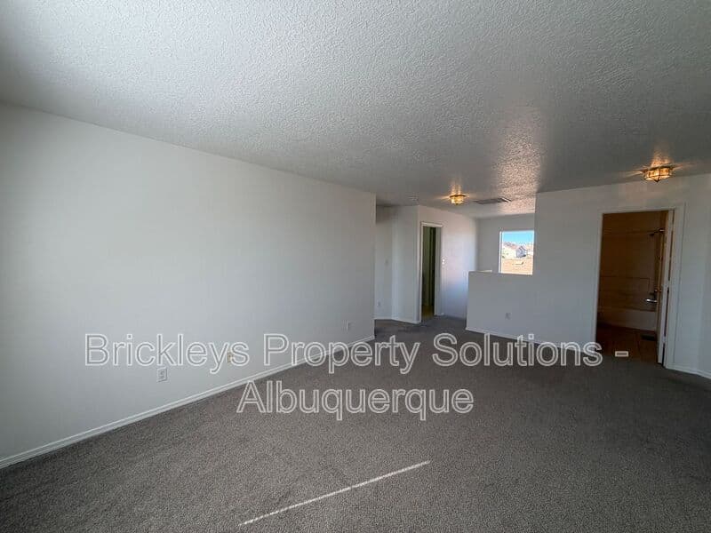4-bedroom 3-bath home at 6027 Park South Pl NW for $2,400/mo managed by Brickleys Property Solutions Albuquerque — photo 30 of 36