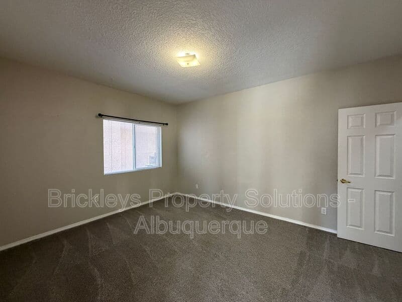 5-bedroom 4.5-bath home at 7008 Tree Line Ave NW for $2,500/mo managed by Brickleys Property Solutions Albuquerque — photo 35 of 43