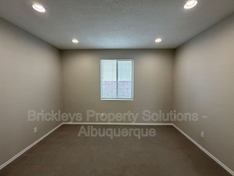3-bedroom 2-bath home at 938 Lazuli Rd SE for $2,475/mo managed by Brickleys Property Solutions Albuquerque — photo 28 of 36