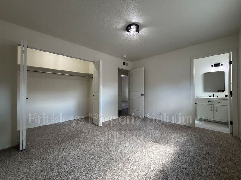 3-bedroom 2-bath home at 5608 Drake Ave NW for $2,100/mo managed by Brickleys Property Solutions Albuquerque — photo 10 of 32