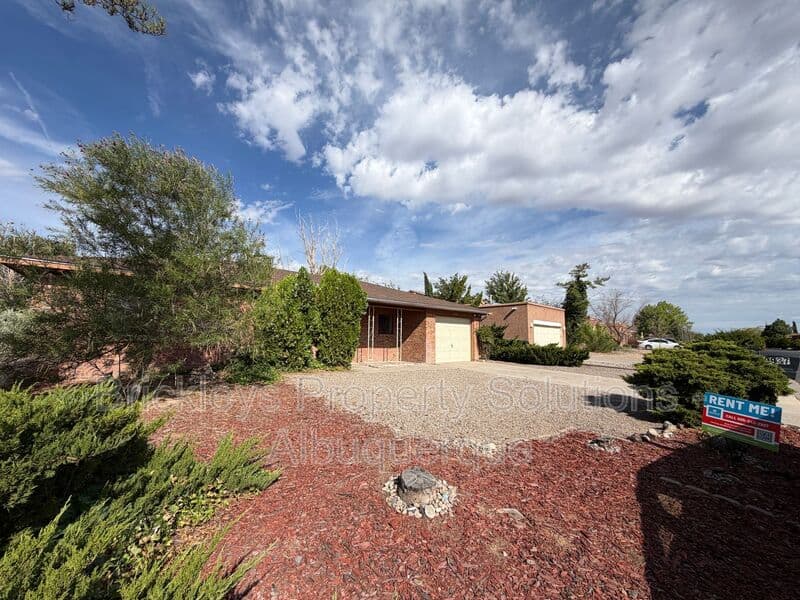 3-bedroom 2-bath home at 9937 Clearwater St. NW for $1,900/mo managed by Brickleys Property Solutions Albuquerque — photo 3 of 27