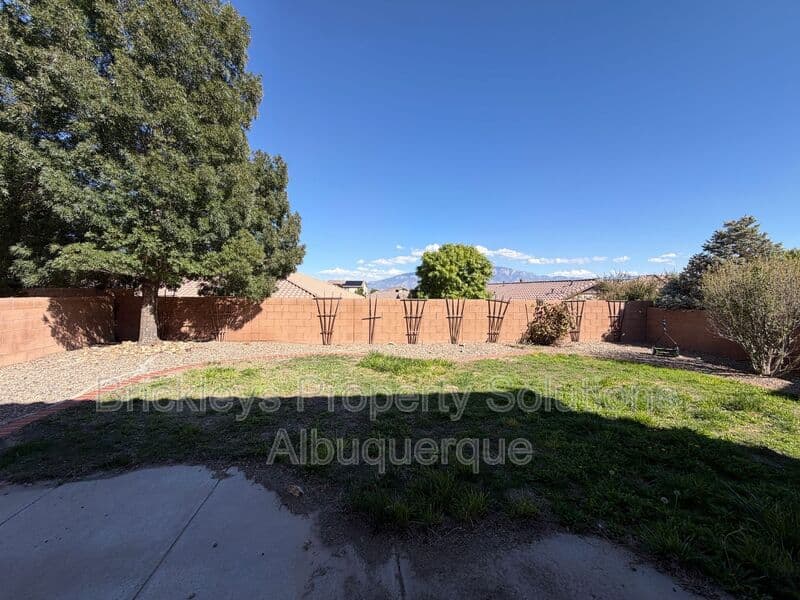 3-bedroom 2.5-bath home at 418 Paseo Roja Pl NE for $2,375/mo managed by Brickleys Property Solutions Albuquerque — photo 39 of 42