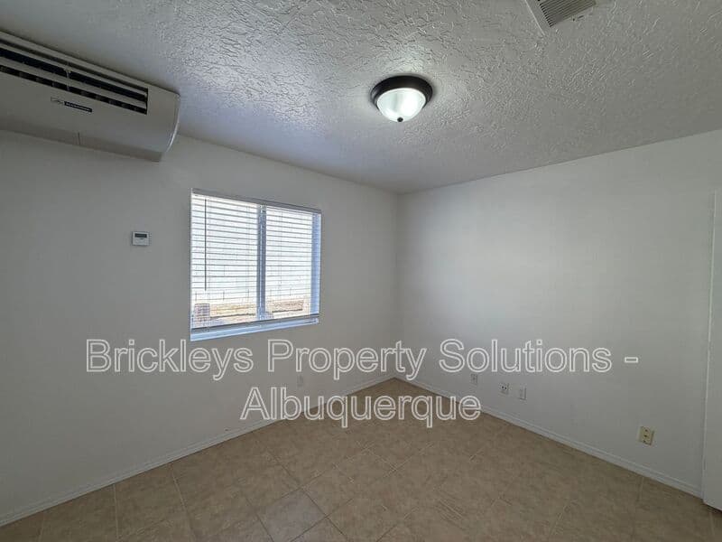 3-bedroom 2-bath home at 1405 Secret Valley Drive SW for $1,800/mo managed by Brickleys Property Solutions Albuquerque — photo 25 of 34