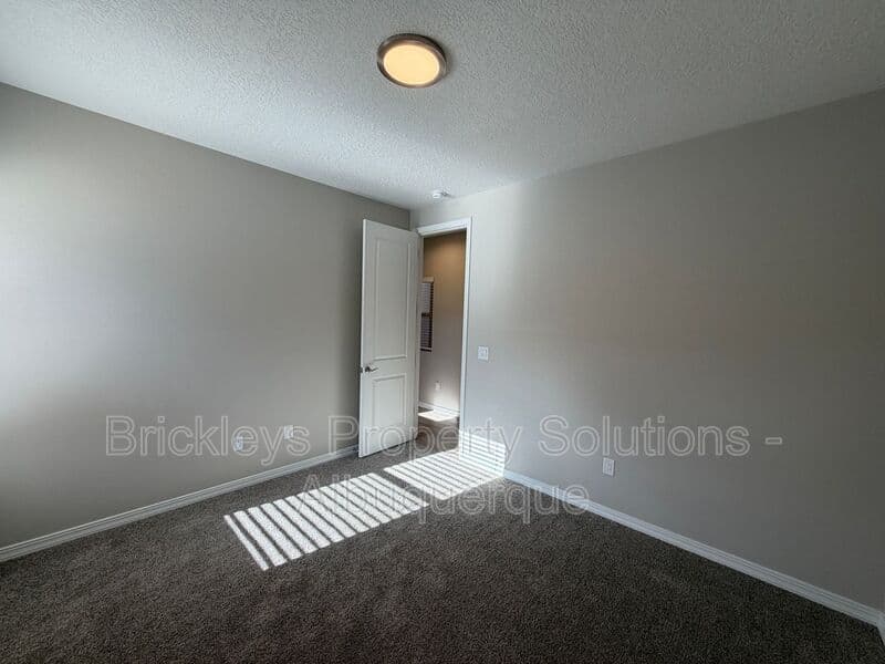 4-bedroom 2-bath home at 3969 Kodiak Rd NE for $2,700/mo managed by Brickleys Property Solutions Albuquerque — photo 12 of 40