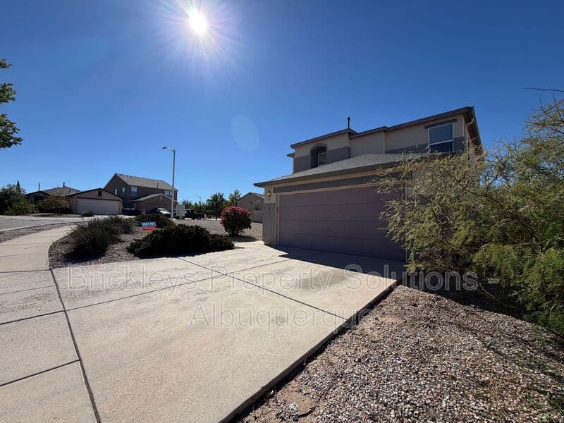 4-bedroom 3-bath home at 6027 Park South Pl NW for $2,400/mo managed by Brickleys Property Solutions Albuquerque — photo 3 of 36