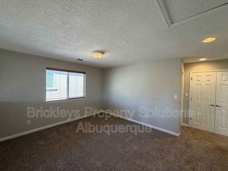 3-bedroom 2.5-bath home at 418 Paseo Roja Pl NE for $2,375/mo managed by Brickleys Property Solutions Albuquerque — photo 7 of 42