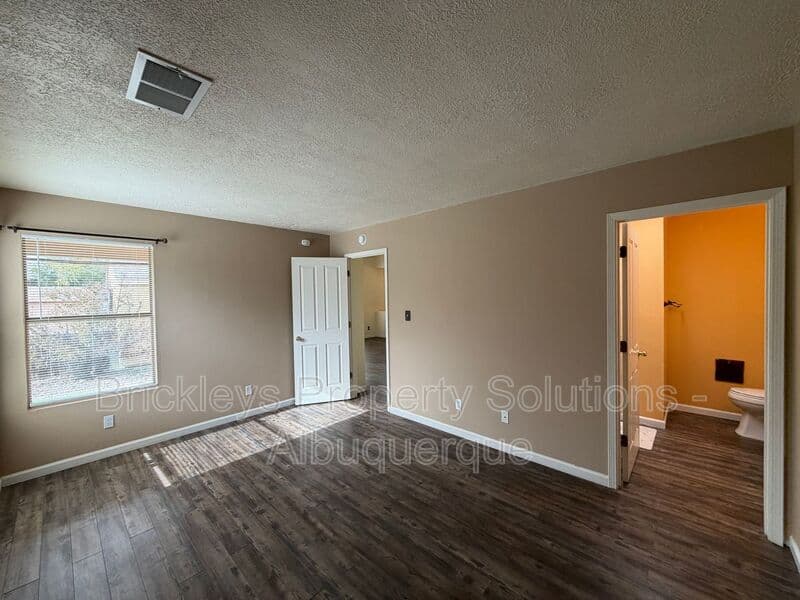 2-bedroom 2-bath home at 1941 Lee Loop NE for $1,750/mo managed by Brickleys Property Solutions Albuquerque — photo 12 of 29
