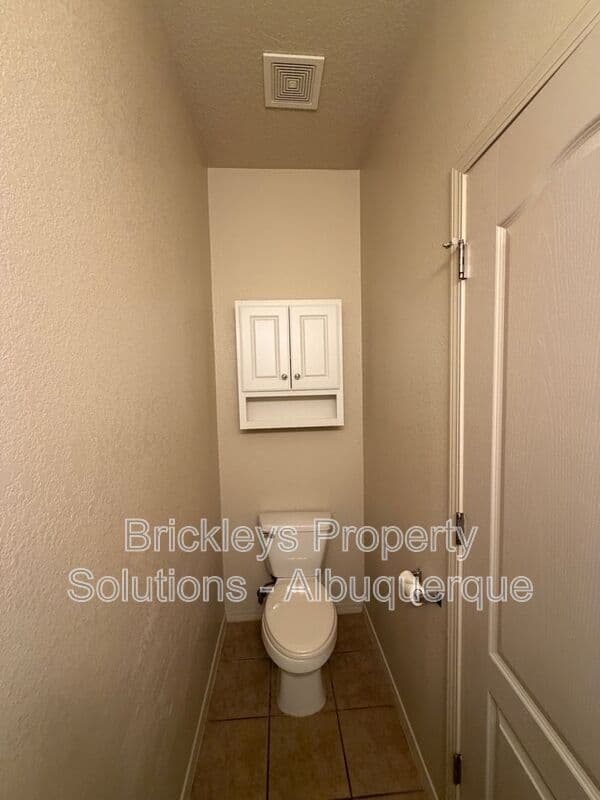 4-bedroom 3.5-bath home at 6228 Nacional Rd NW for $2,700/mo managed by Brickleys Property Solutions Albuquerque — photo 26 of 44