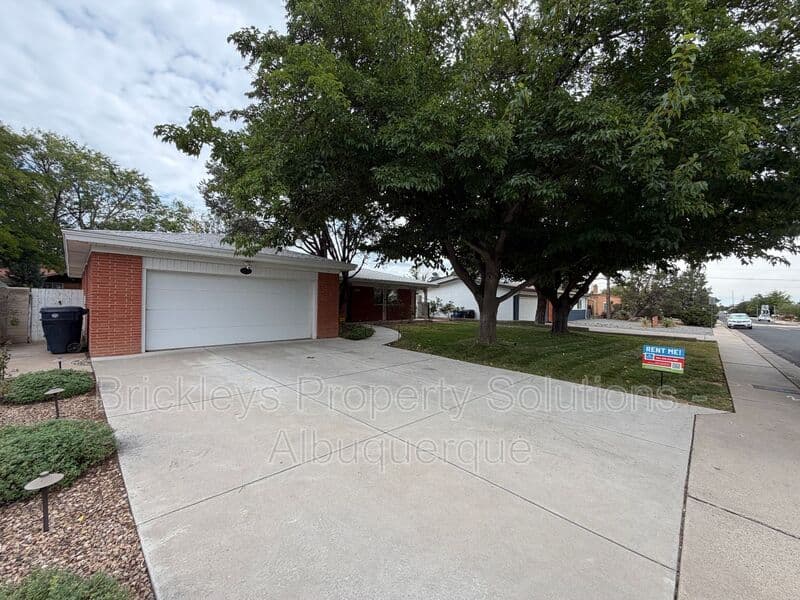 3-bedroom 2-bath home at 2808 Charleston St NE for $2,500/mo managed by Brickleys Property Solutions Albuquerque — photo 3 of 35
