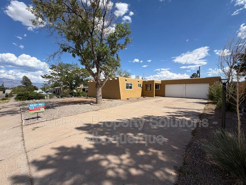 3-bedroom 2-bath home at 5608 Drake Ave NW for $2,100/mo managed by Brickleys Property Solutions Albuquerque — photo 3 of 32