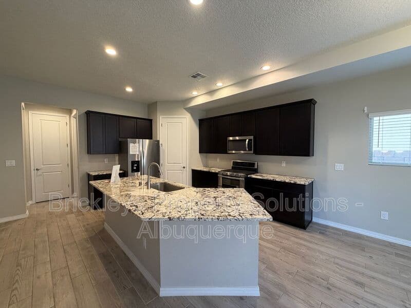 4-bedroom 2-bath home at 3969 Kodiak Rd NE for $2,700/mo managed by Brickleys Property Solutions Albuquerque — photo 27 of 40