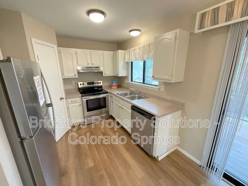 3-bedroom 2-bath home at 8214 Steadman Dr for $2,175/mo managed by Brickleys Property Solutions Colorado Springs — photo 15 of 34
