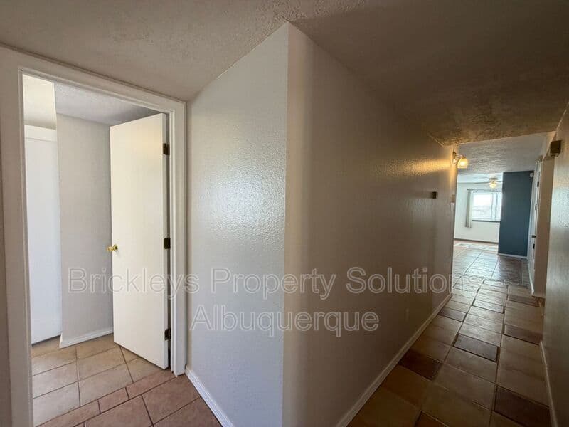 4-bedroom 2-bath home at 5812 Brahma Dr NW for $1,950/mo managed by Brickleys Property Solutions Albuquerque — photo 19 of 35