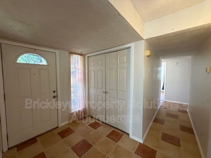 4-bedroom 2-bath home at 5812 Brahma Dr NW for $1,950/mo managed by Brickleys Property Solutions Albuquerque — photo 6 of 35