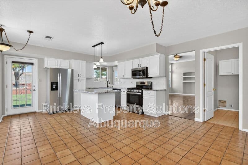 4-bedroom 2-bath home at 2413 Agua Fria Dr NE for $2,275/mo managed by Brickleys Property Solutions Albuquerque — photo 24 of 42