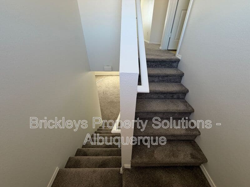 4-bedroom 3-bath home at 6027 Park South Pl NW for $2,400/mo managed by Brickleys Property Solutions Albuquerque — photo 17 of 36
