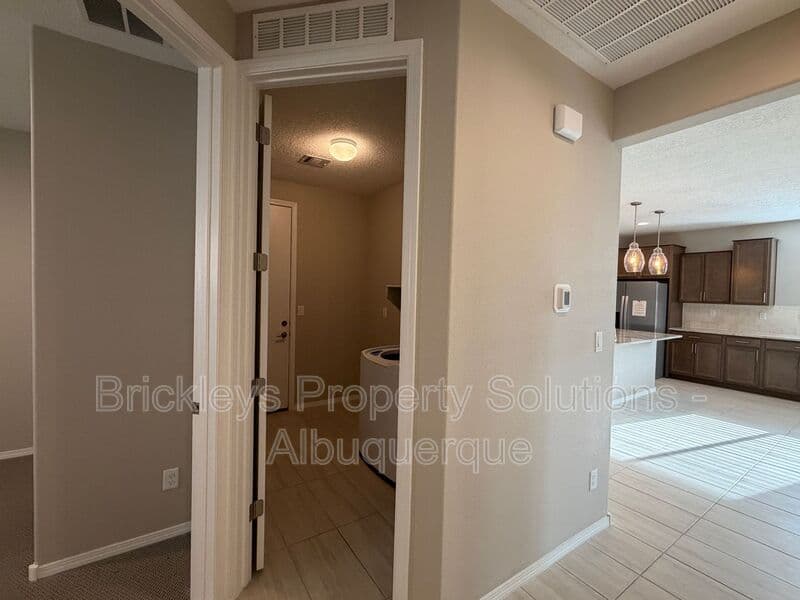 3-bedroom 2-bath home at 938 Lazuli Rd SE for $2,475/mo managed by Brickleys Property Solutions Albuquerque — photo 32 of 36