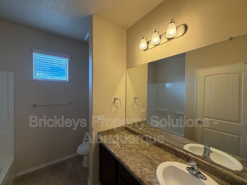 3-bedroom 2-bath home at 7304 Skagway Dr. NE for $2,200/mo managed by Brickleys Property Solutions Albuquerque — photo 9 of 36
