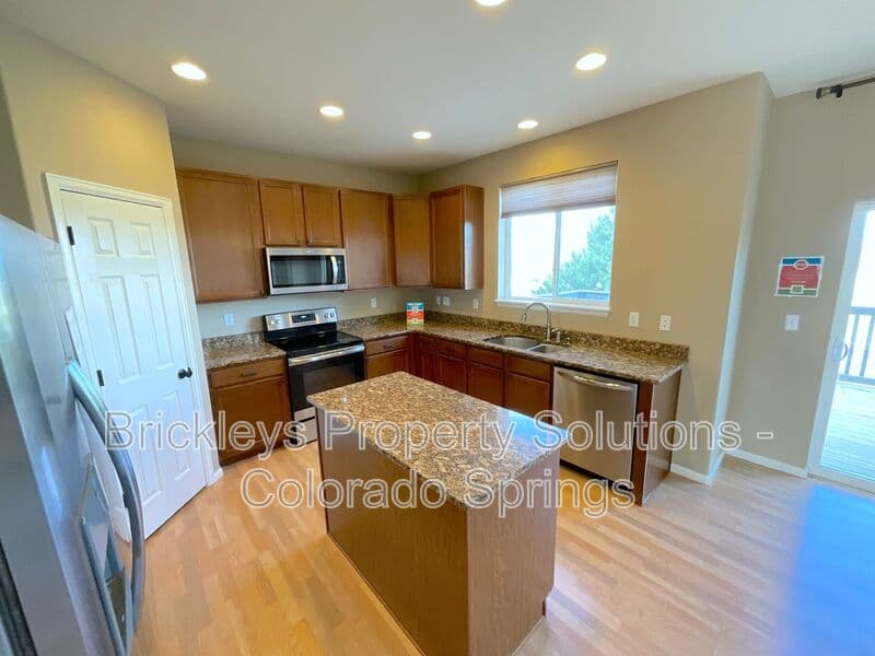 4-bedroom 2.5-bath home at 6652 Maple Stone Ln for $2,600/mo managed by Brickleys Property Solutions Colorado Springs — photo 18 of 43