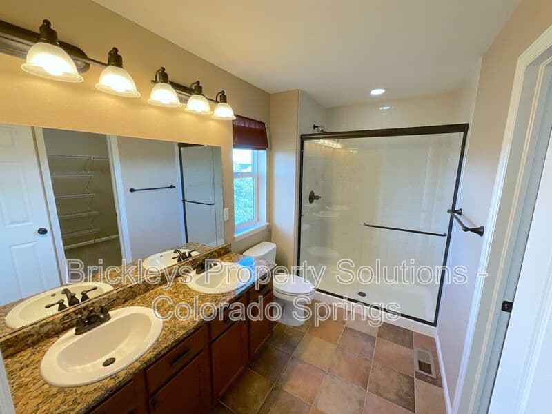 4-bedroom 2.5-bath home at 6652 Maple Stone Ln for $2,600/mo managed by Brickleys Property Solutions Colorado Springs — photo 30 of 43