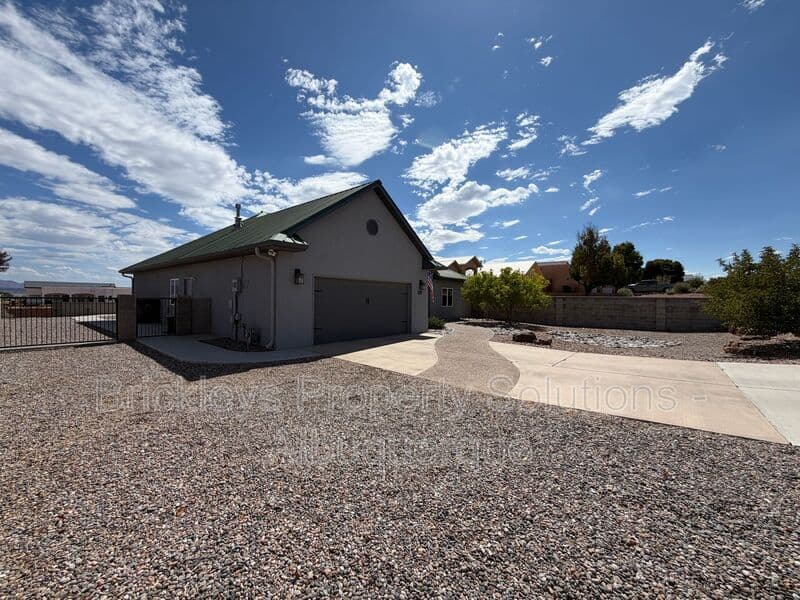 3-bedroom 2-bath home at 6812 Nagoya Rd NE for $2,700/mo managed by Brickleys Property Solutions Albuquerque — photo 3 of 43