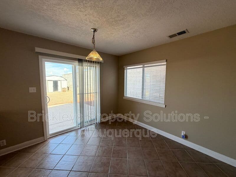 3-bedroom 2.5-bath home at 10527 Brookline Pl NW for $2,300/mo managed by Brickleys Property Solutions Albuquerque — photo 31 of 40