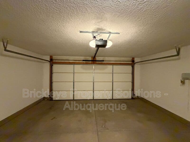 3-bedroom 2-bath home at 8035 Sierra Altos Pl. NW for $2,150/mo managed by Brickleys Property Solutions Albuquerque — photo 25 of 29