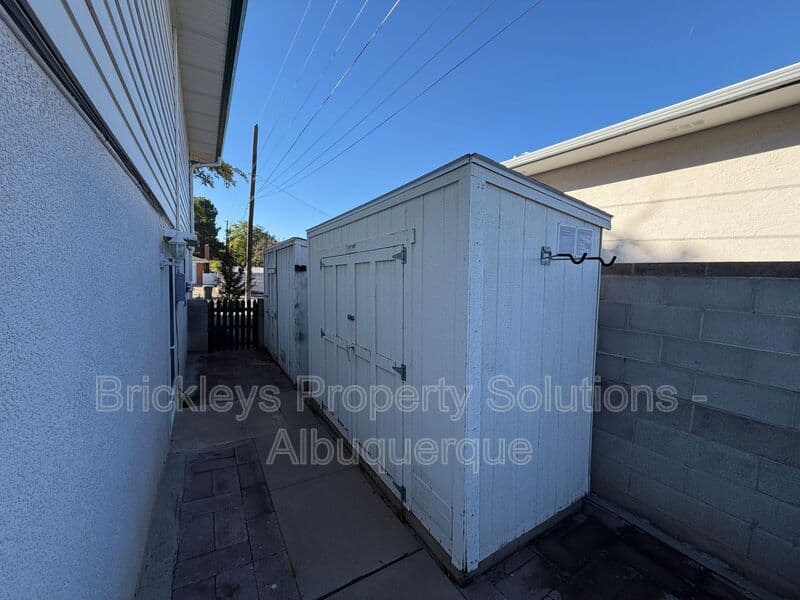 4-bedroom 3-bath home at 7121 Edwina Ave NE for $2,450/mo managed by Brickleys Property Solutions Albuquerque — photo 47 of 47