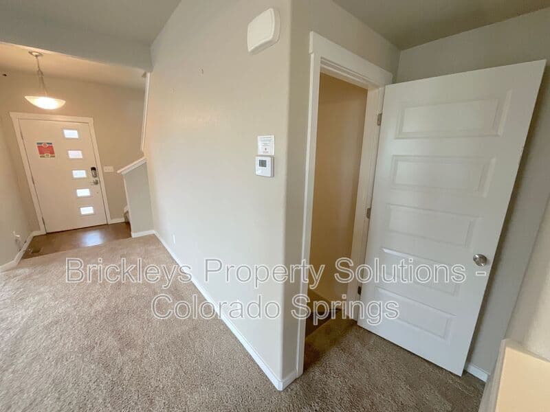 3-bedroom 2.5-bath home at 2401 Ellingwood Dr for $2,233/mo total (includes $2,195 base rent + $38 required Tenant Benefit Package) managed by Brickleys Property Solutions Colorado Springs — photo 38 of 40