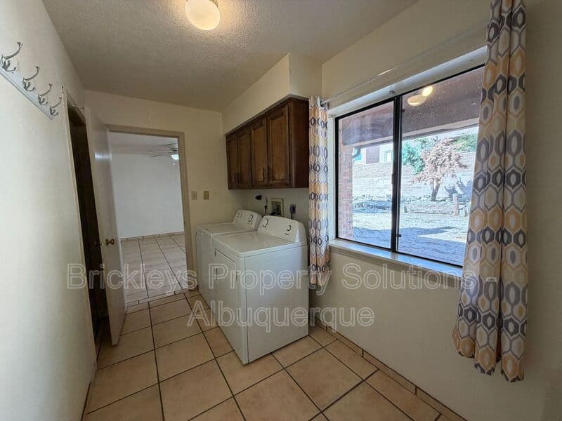3-bedroom 2-bath home at 9937 Clearwater St. NW for $1,900/mo managed by Brickleys Property Solutions Albuquerque — photo 21 of 27