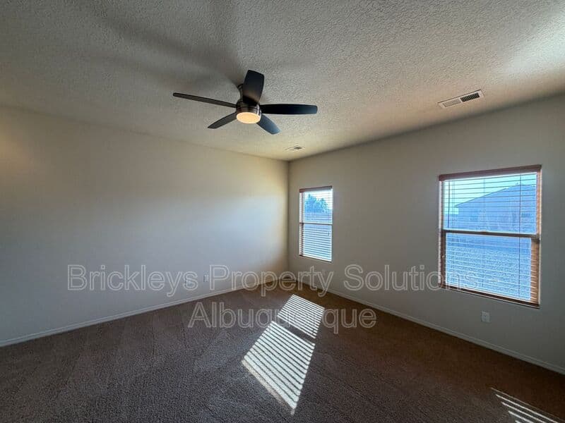 4-bedroom 3.5-bath home at 6228 Nacional Rd NW for $2,700/mo managed by Brickleys Property Solutions Albuquerque — photo 27 of 44