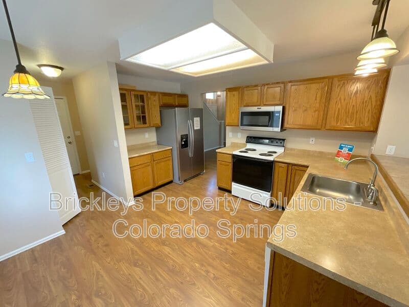 4-bedroom 3.5-bath home at 6160 Jaffee Ct for $2,500/mo managed by Brickleys Property Solutions Colorado Springs — photo 17 of 45