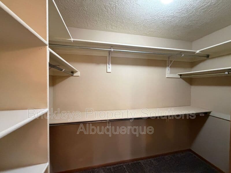 3-bedroom 2-bath home at 12606 Colony Pl NE for $2,250/mo managed by Brickleys Property Solutions Albuquerque — photo 17 of 32