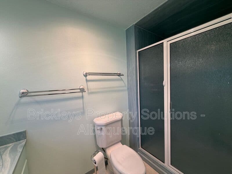 4-bedroom 3-bath home at 7121 Edwina Ave NE for $2,450/mo managed by Brickleys Property Solutions Albuquerque — photo 27 of 47