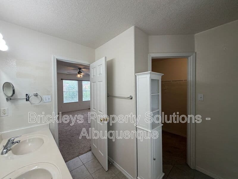 3-bedroom 3-bath home at 5004 Blue Stone Rd NW for $2,250/mo managed by Brickleys Property Solutions Albuquerque — photo 25 of 37