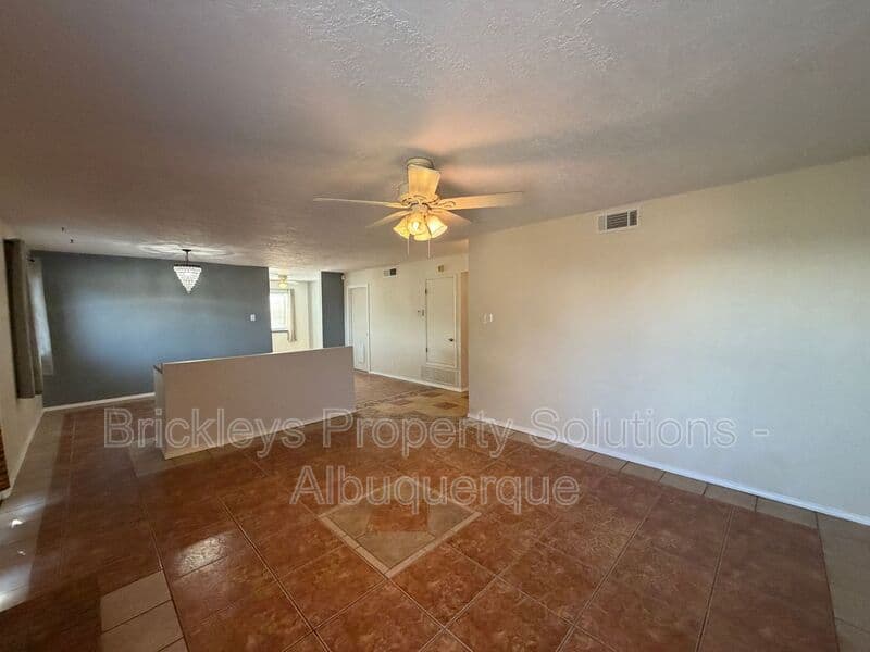 4-bedroom 2-bath home at 5812 Brahma Dr NW for $1,950/mo managed by Brickleys Property Solutions Albuquerque — photo 23 of 35