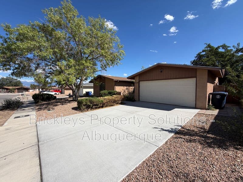 4-bedroom 2-bath home at 5812 Brahma Dr NW for $1,950/mo managed by Brickleys Property Solutions Albuquerque — photo 3 of 35