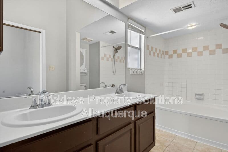 4-bedroom 2-bath home at 2413 Agua Fria Dr NE for $2,275/mo managed by Brickleys Property Solutions Albuquerque — photo 41 of 42