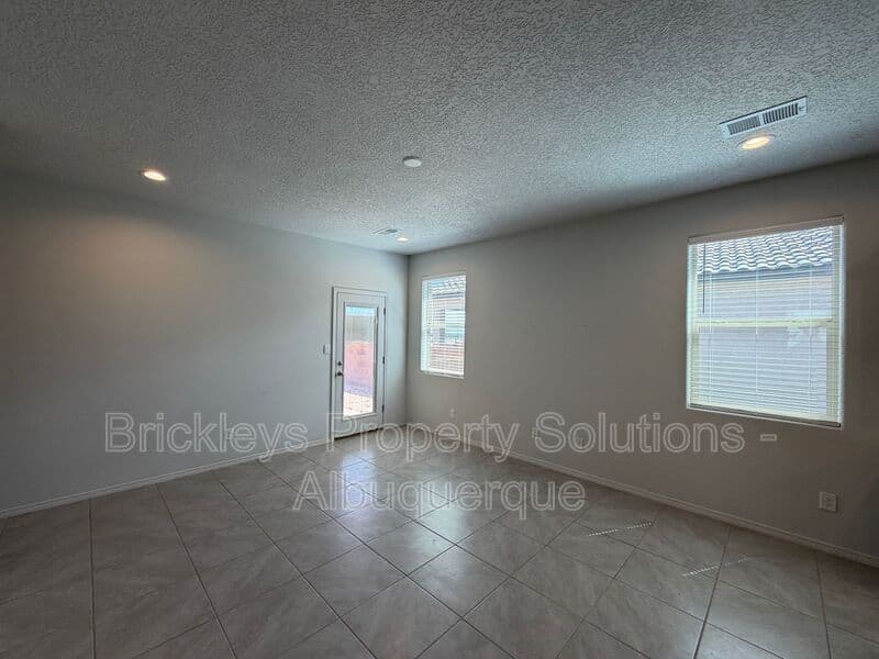 3-bedroom 2-bath home at 1504 Alto Colores for $2,100/mo managed by Brickleys Property Solutions Albuquerque — photo 9 of 30
