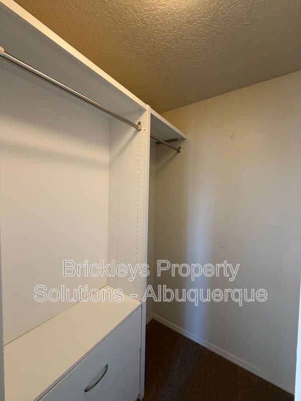 4-bedroom 3.5-bath home at 6228 Nacional Rd NW for $2,700/mo managed by Brickleys Property Solutions Albuquerque — photo 14 of 44