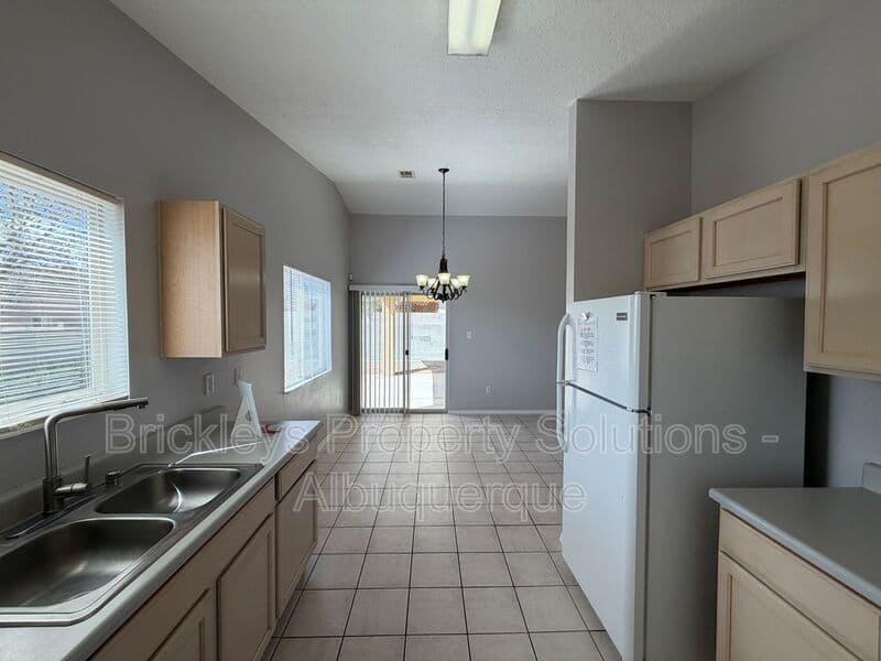 3-bedroom 2-bath home at 10601 Rio Del Sole Ct NW for $2,000/mo managed by Brickleys Property Solutions Albuquerque — photo 10 of 29