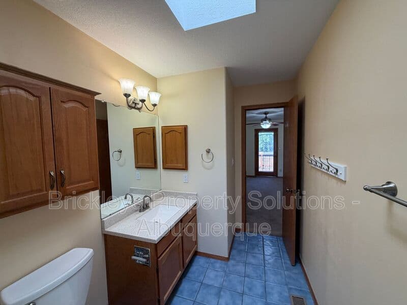 3-bedroom 2.5-bath home at 9600 Allande Rd NE for $3,200/mo managed by Brickleys Property Solutions Albuquerque — photo 13 of 40