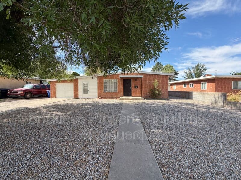 3-bedroom 2-bath home at 4712 Palo Duro Ave. NE for $1,750/mo managed by Brickleys Property Solutions Albuquerque — photo 2 of 38