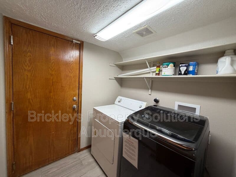 4-bedroom 2.5-bath home at 10331 Dunbar St NW for $2,300/mo managed by Brickleys Property Solutions Albuquerque — photo 37 of 43