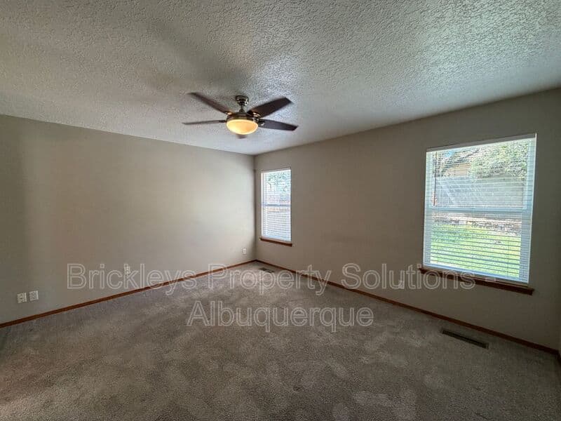 4-bedroom 2.5-bath home at 10331 Dunbar St NW for $2,300/mo managed by Brickleys Property Solutions Albuquerque — photo 30 of 43